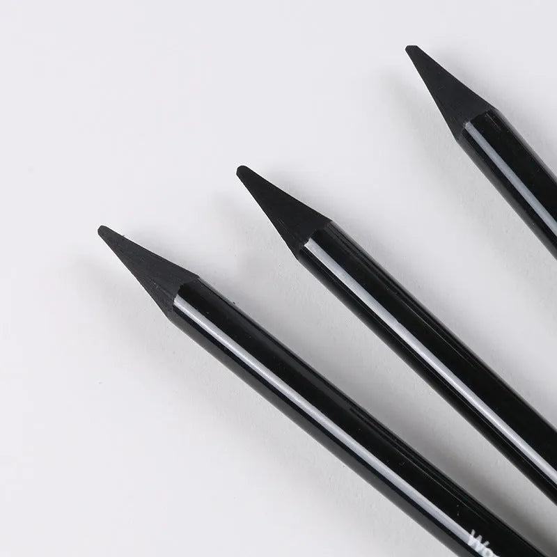 Carbonized pencil set showing 6 graphite and 3 carbonized pencils on suction card packaging