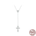Women's silver cross necklace with V-neck design and O-ring chain.