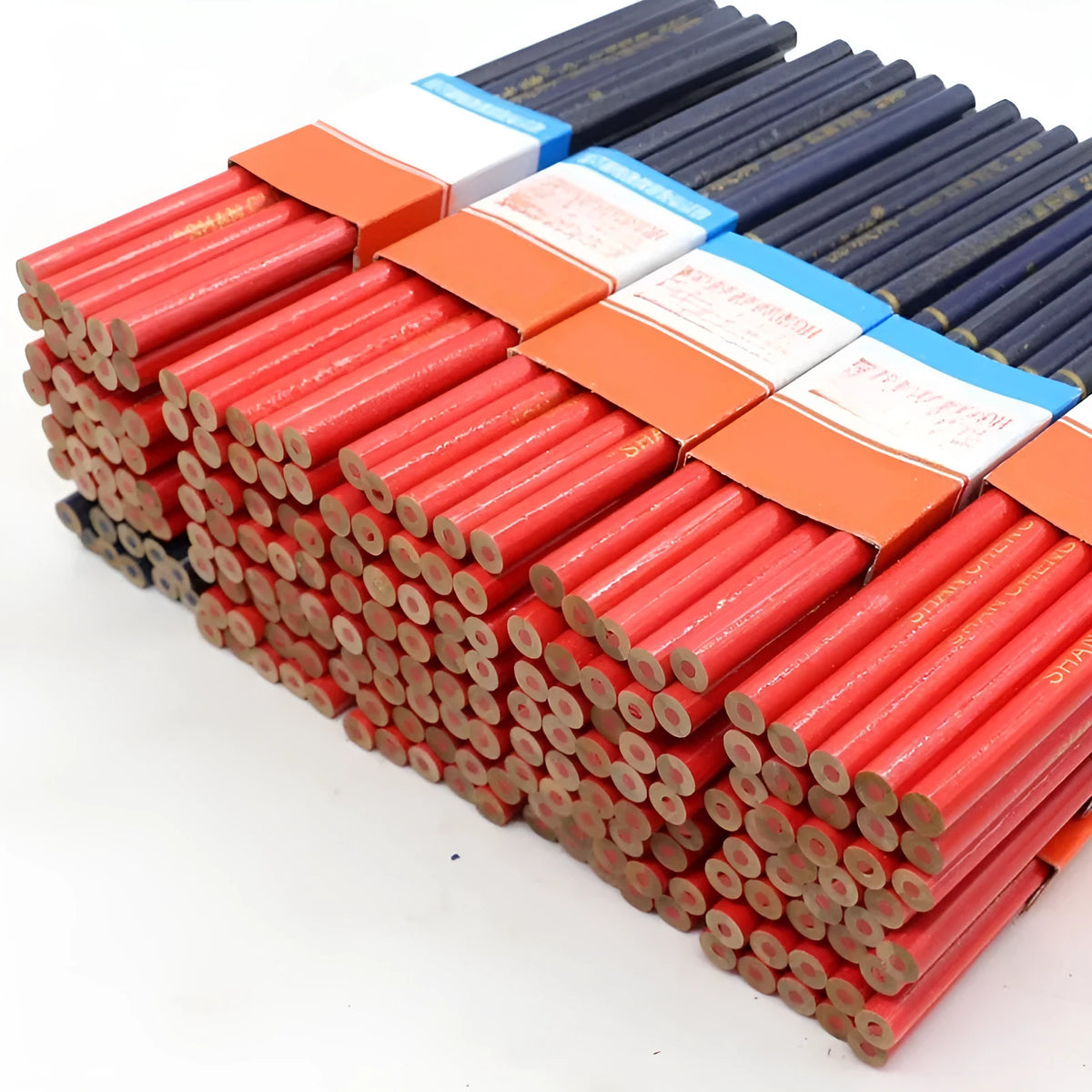 Red and blue wooden carpenter pencils with round barrels in 10-piece set for woodworking marking