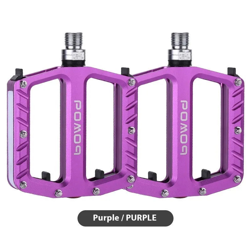 Aluminium alloy bicycle pedals with integrated LED illumination in black purple red gold titanium colour options