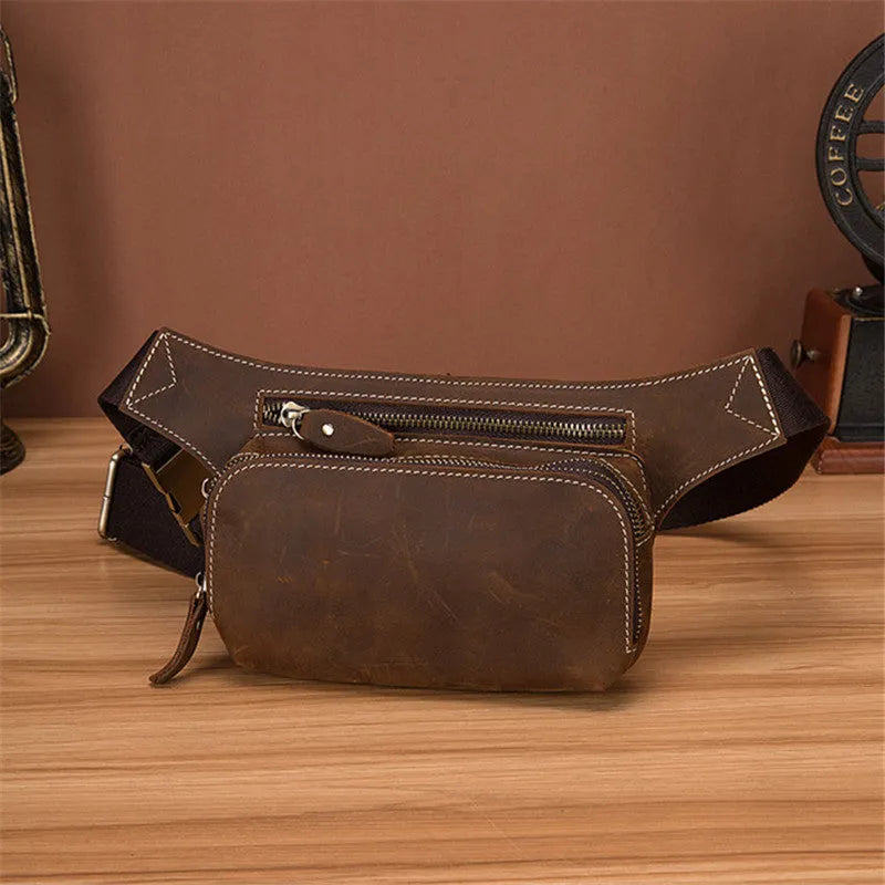 Brown cowhide leather men's sports waist bag with a zip closure.