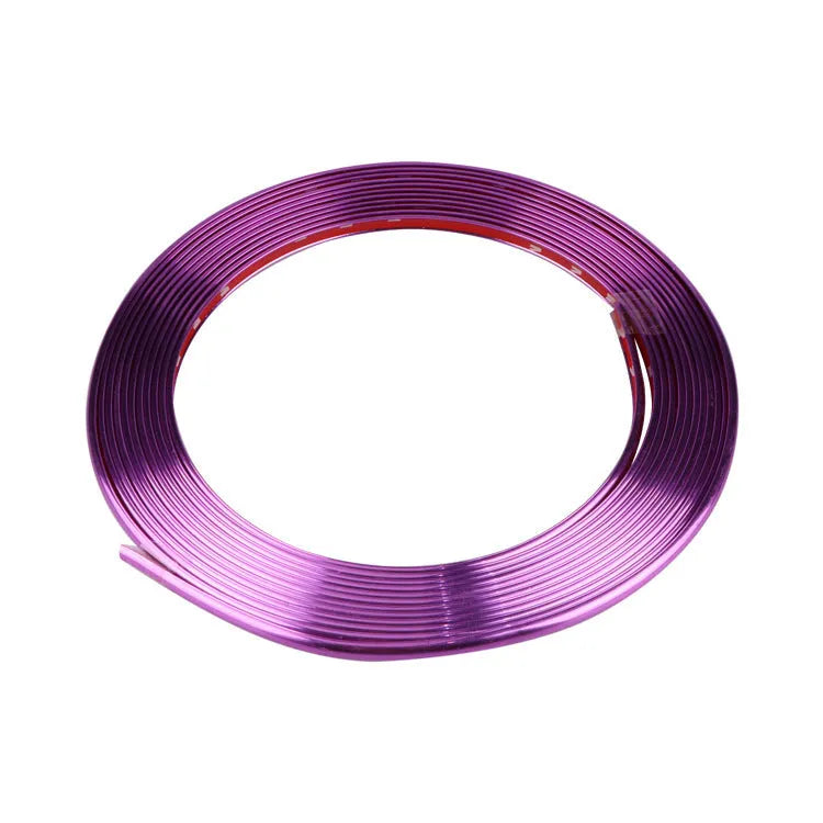 8 metre roll of electroplated purple PVC wheel hub trim strip on a white background.