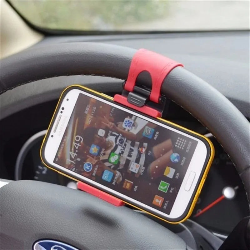 Black steering wheel phone clip mount holder showing adjustable clip and phone placement