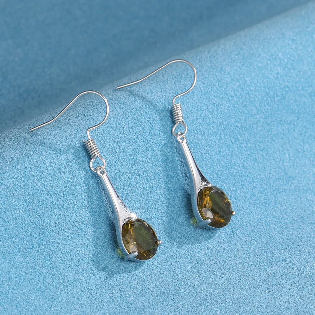 Olive green topaz drop earrings with water shape design and retro style on alloy background