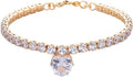 Gold rhinestone heart-shaped pet collar for dog or cat with bling design on a black background.