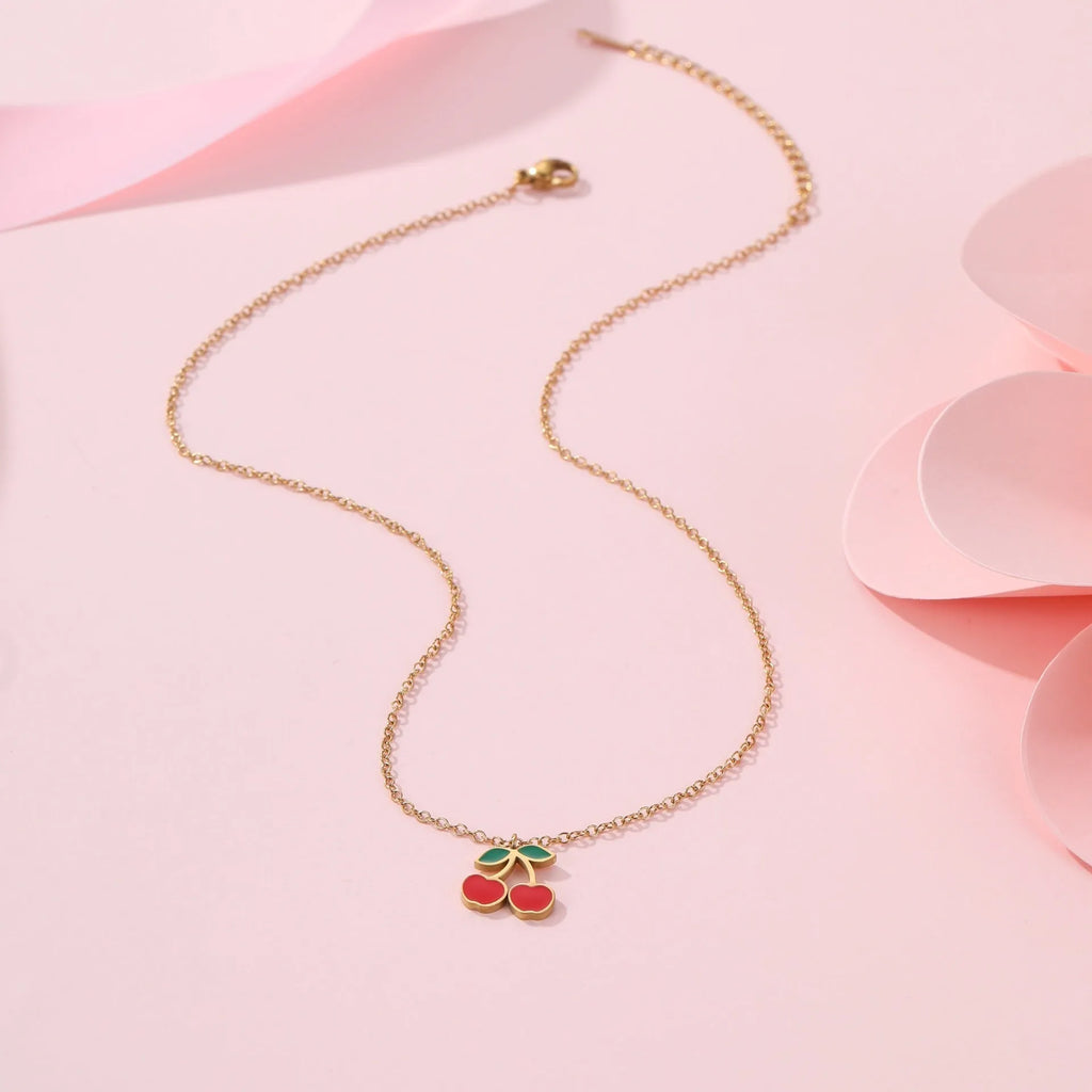 Cherry design stainless steel necklace, bracelet, earrings, and ring set with 18K electroplated finish.