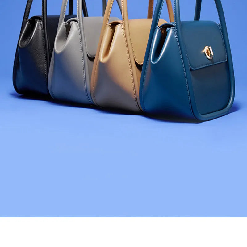 Cow leather wing shape tote bag with cross-body strap in one of four colour options
