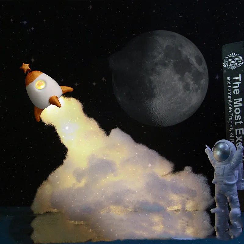 DIY astronaut rocket night light kit with warm LED string lights and assembly materials