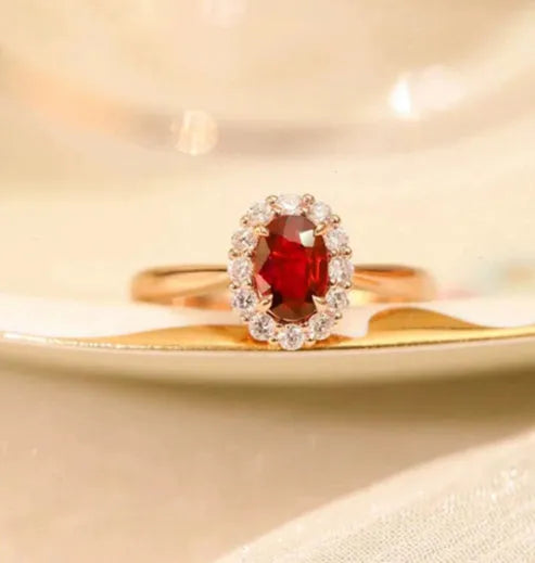 Women's silver ring with blood ruby artificial gemstone and gold pigeon floral design