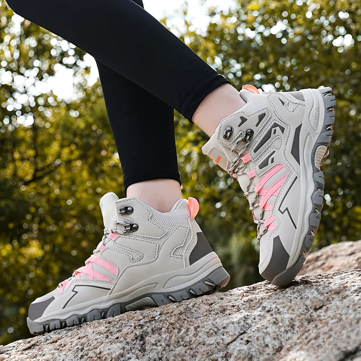 High-top hiking sneaker in light brown with front lace-up closure and natural rubber sole.