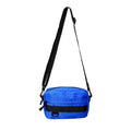 Men's solid color polyester nylon messenger bag with sewing thread detail and crossbody strap in black blue green or white