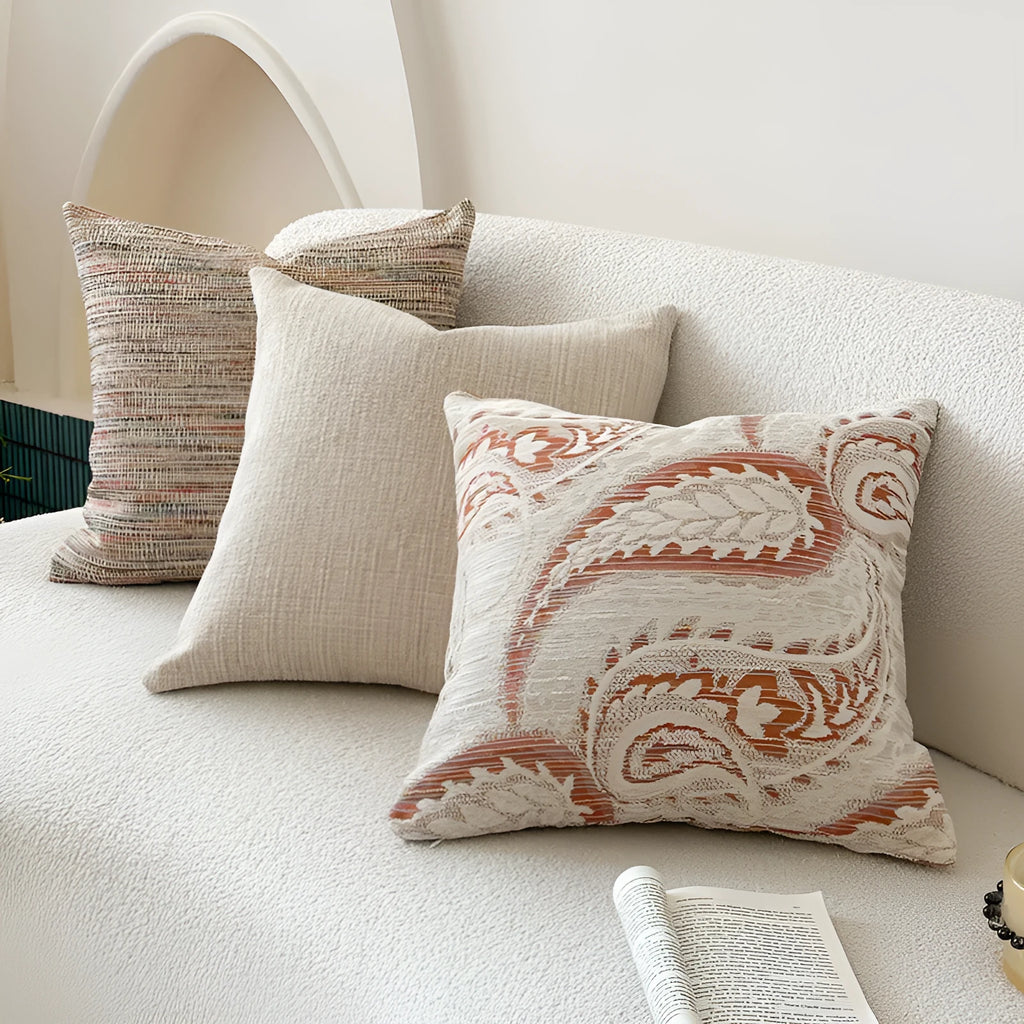American-style jacquard paisley decorative pillow cover in amber tones on a sofa, showing square and rectangular size options.