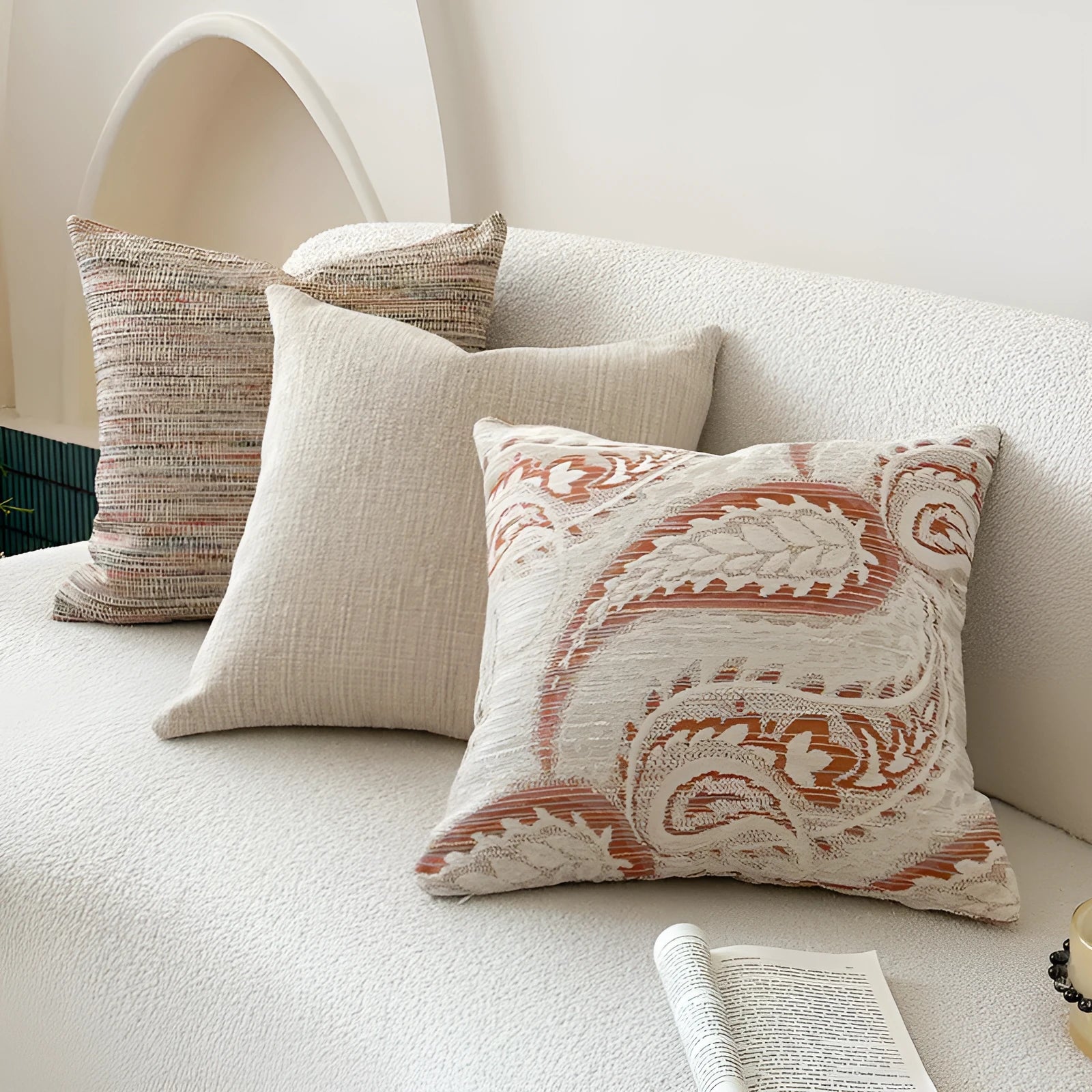 American-style jacquard paisley decorative pillow cover in amber tones on a sofa, showing square and rectangular size options.
