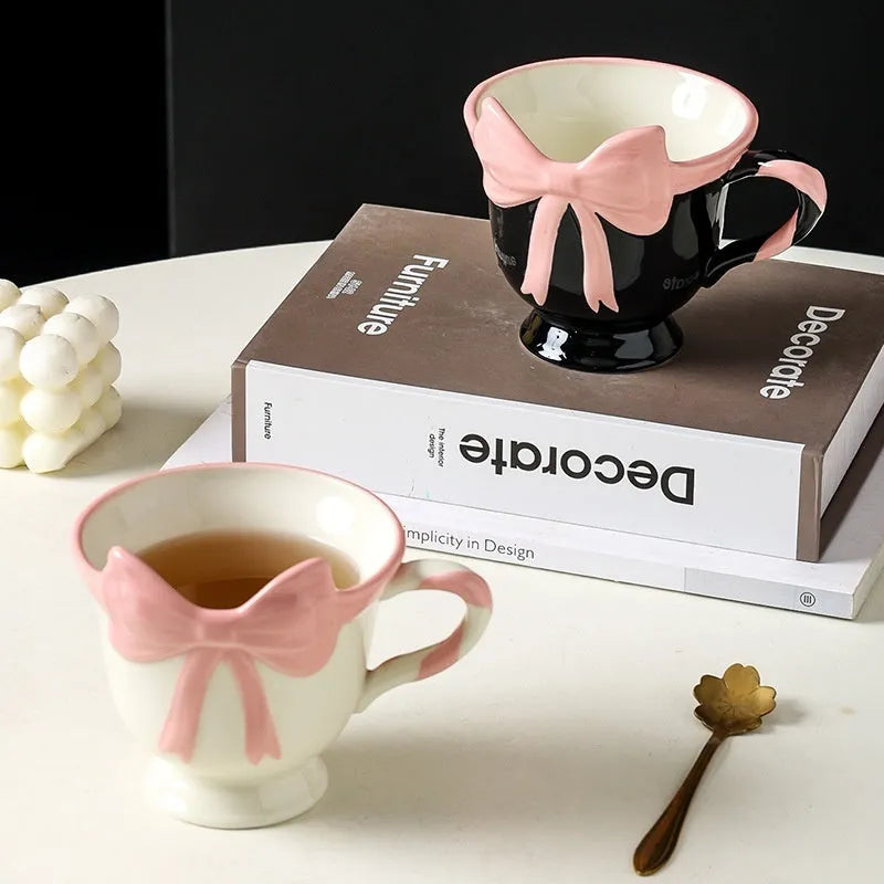 Ceramic mug with heart bow design in black pink or white powder, 301-400ml capacity