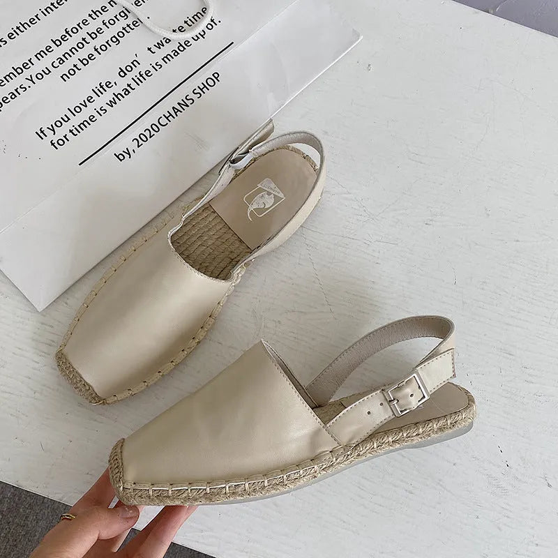 Baotou women's flat sandals in retro fisherman style with canvas upper and soft leather finish.