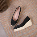 Women's wedge heel pumps with thick platform sole and rope detail at heel in apricot.