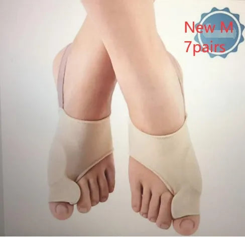 Corrective bunion relief sock with gel pad and silicone toe separator on a foot.