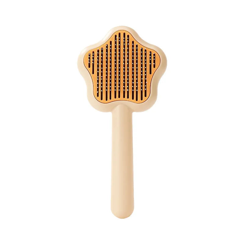 Green or yellow self-cleaning cat comb with stainless steel teeth, showing 20cm length.