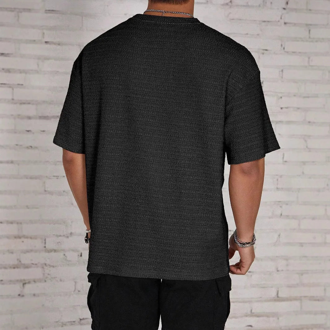 Men's slim fit loose hollow knit t-shirt in polyester available in black, white, light blue and khaki colours