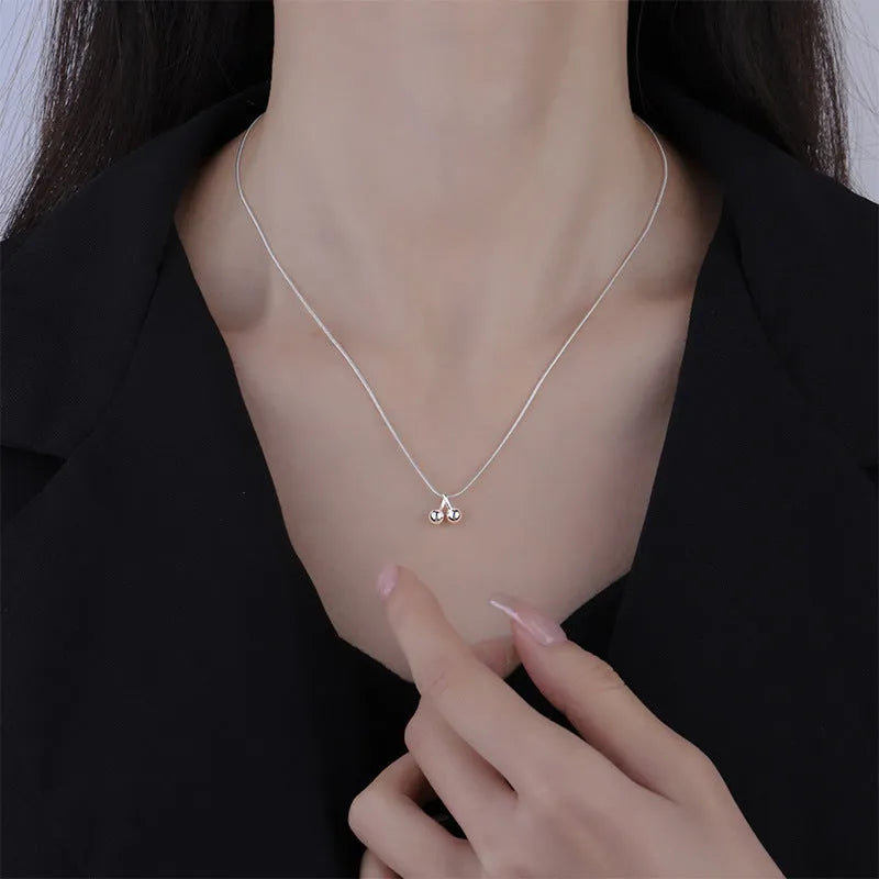 Silver cherry necklace with adjustable snake chain and fruit-shaped pendant