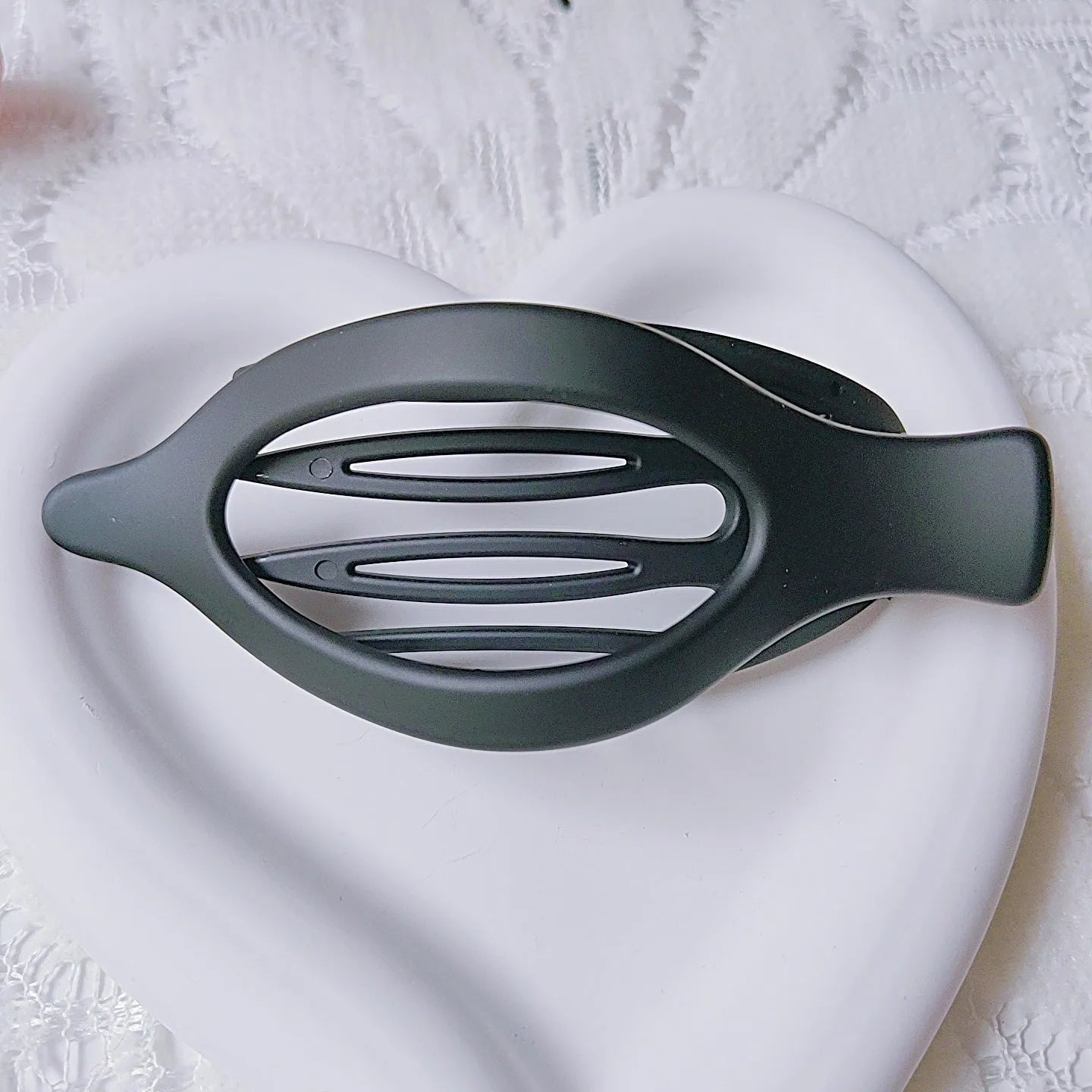 Six rose red plastic hair clips with a frosted grip and pointed toe B-style design.