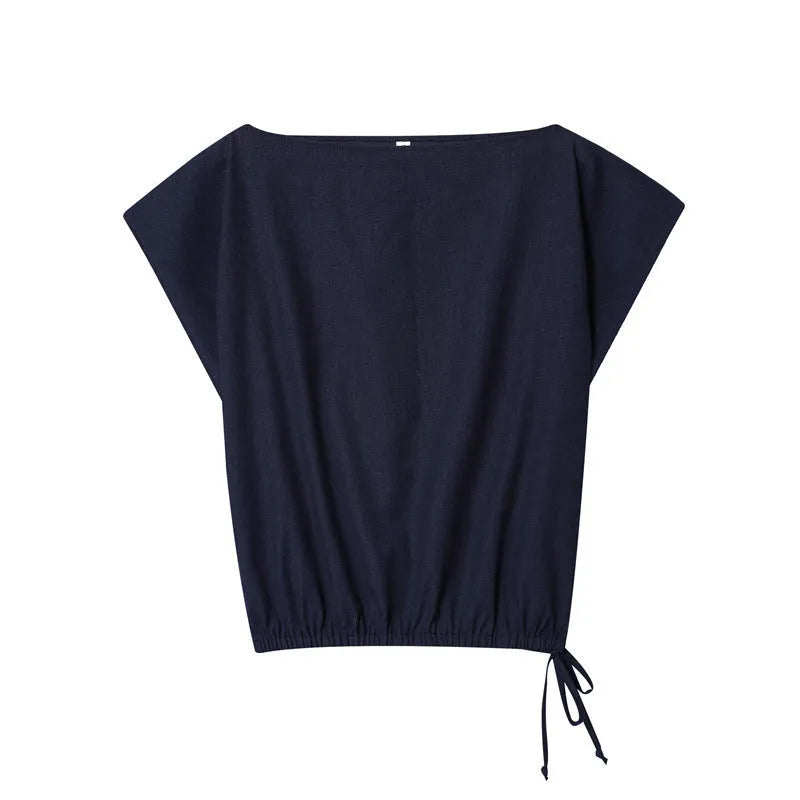 Women's beige linen-look shirt with flounced sleeves and matching wide-leg trousers on a hanger.