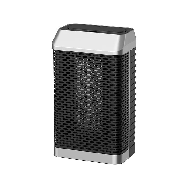 Black desktop smart heater with remote control on a wooden desk.