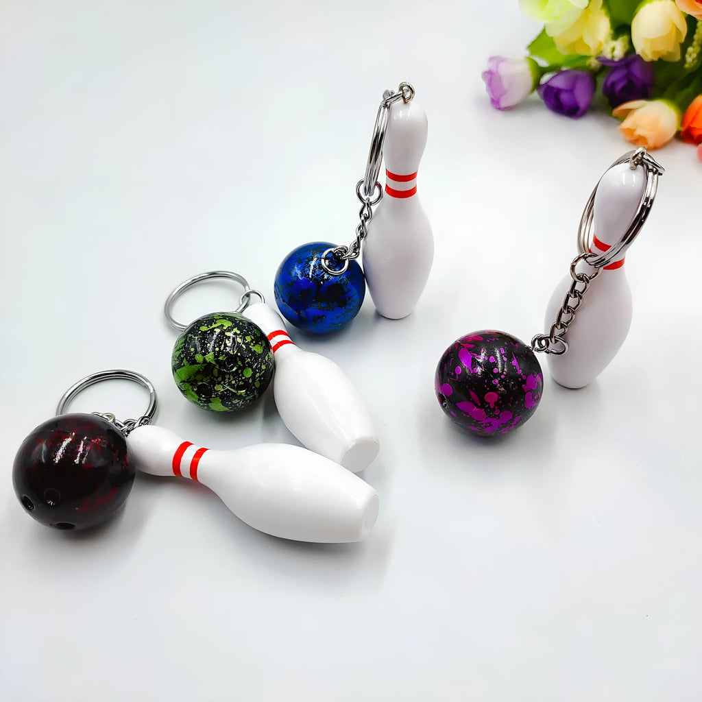 Miniature bowling ball keychain pendant in choice of four colours with key ring attachment
