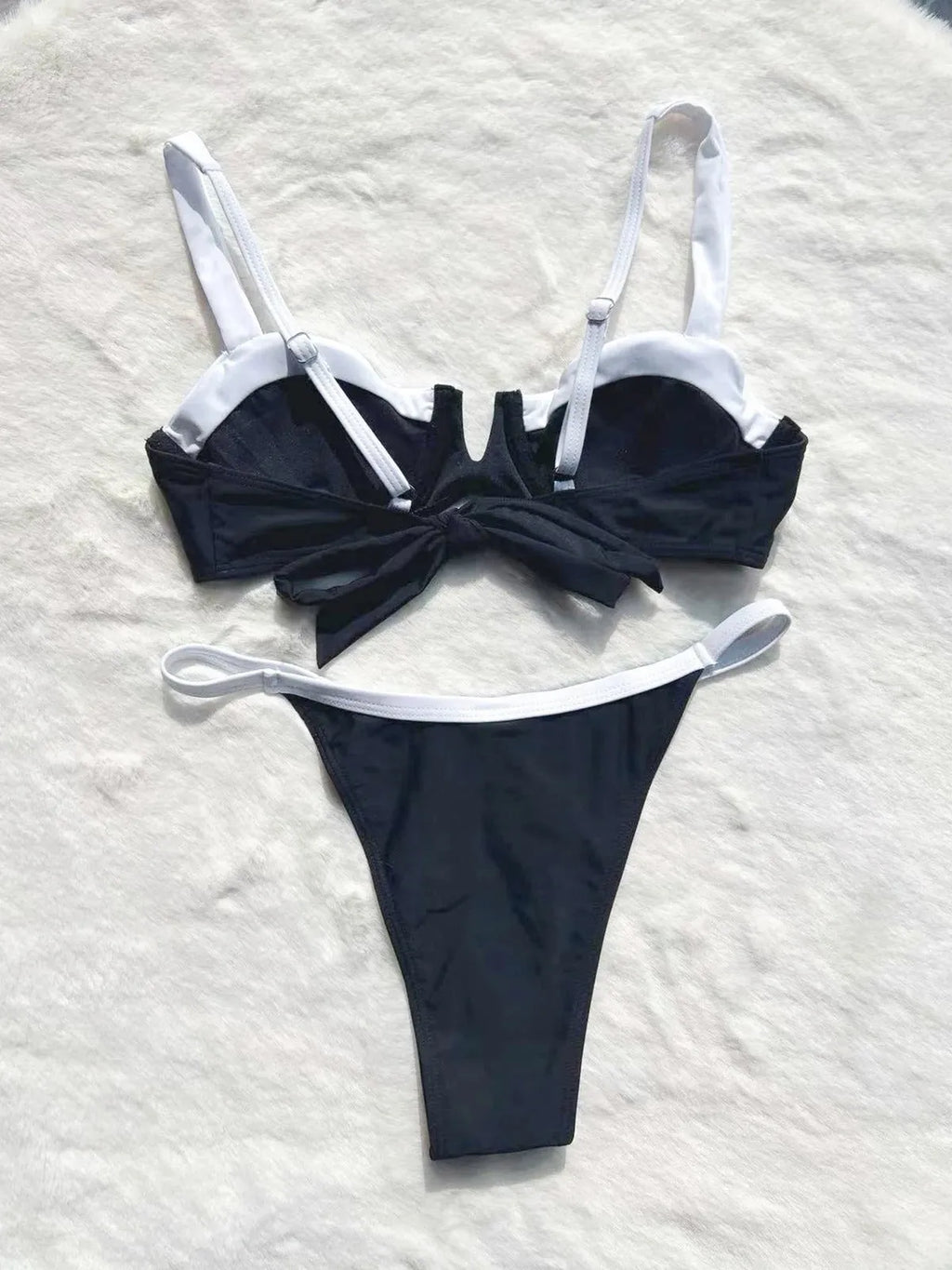 Black women's low waist bikini swimsuit set with stitching detail on split briefs