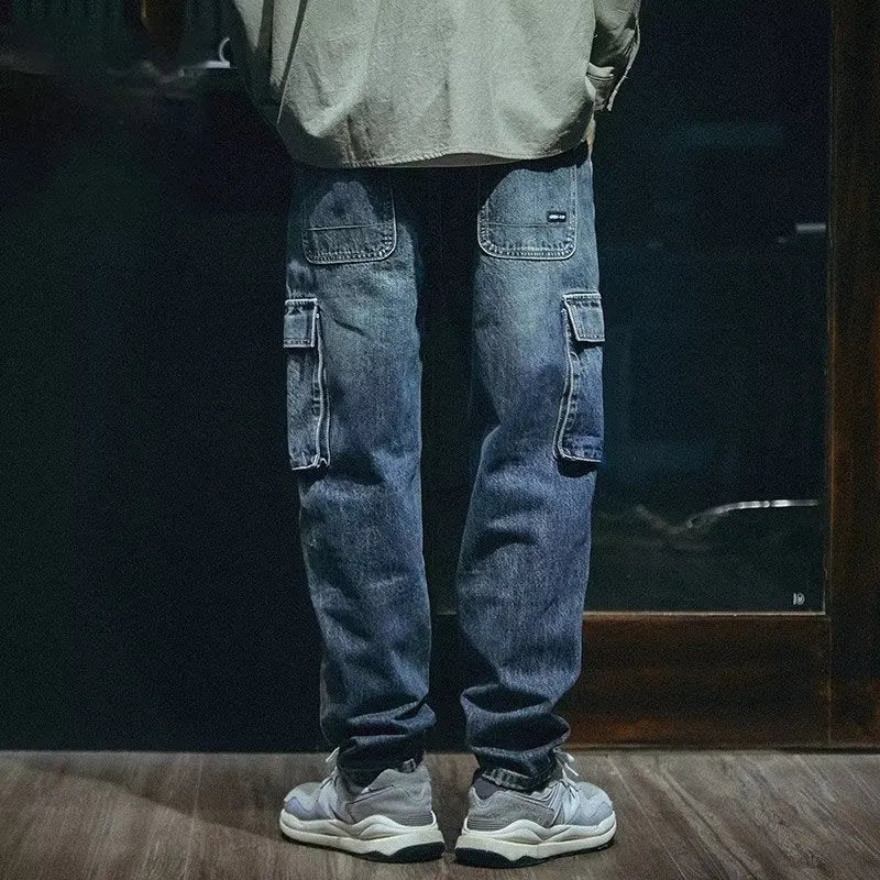 Men's blue loose straight leg stretch jeans with zip fly opening in casual retro style
