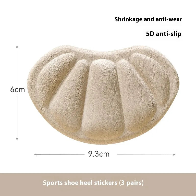Three pairs of camel-coloured suede heel cushion pads with adhesive backing, each measuring 9.3x6cm