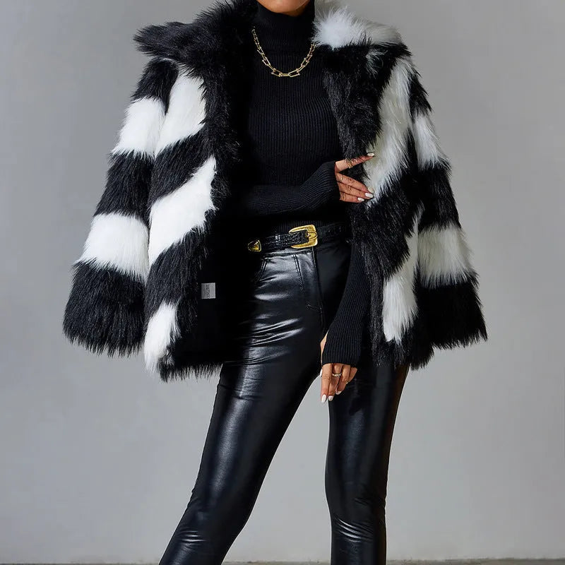 Women's faux fur coat with contrasting colour lapels and a fur collar.