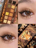 Explorer twelve-colour animal-themed pressed powder eyeshadow palette open showing matte and shimmer shades