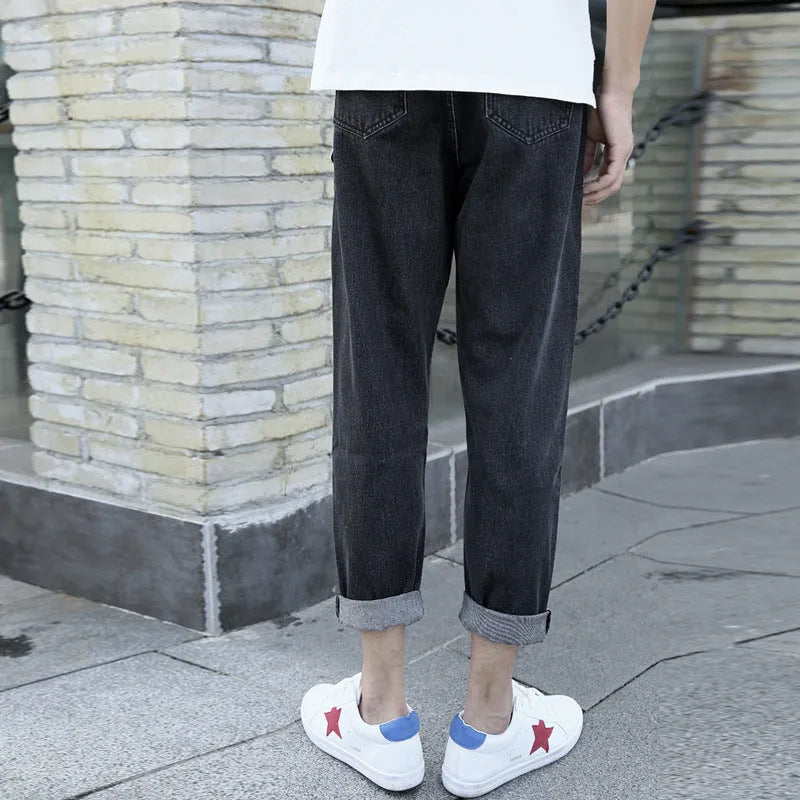 Men's black straight leg jeans with loose harem style and light straight leg opening