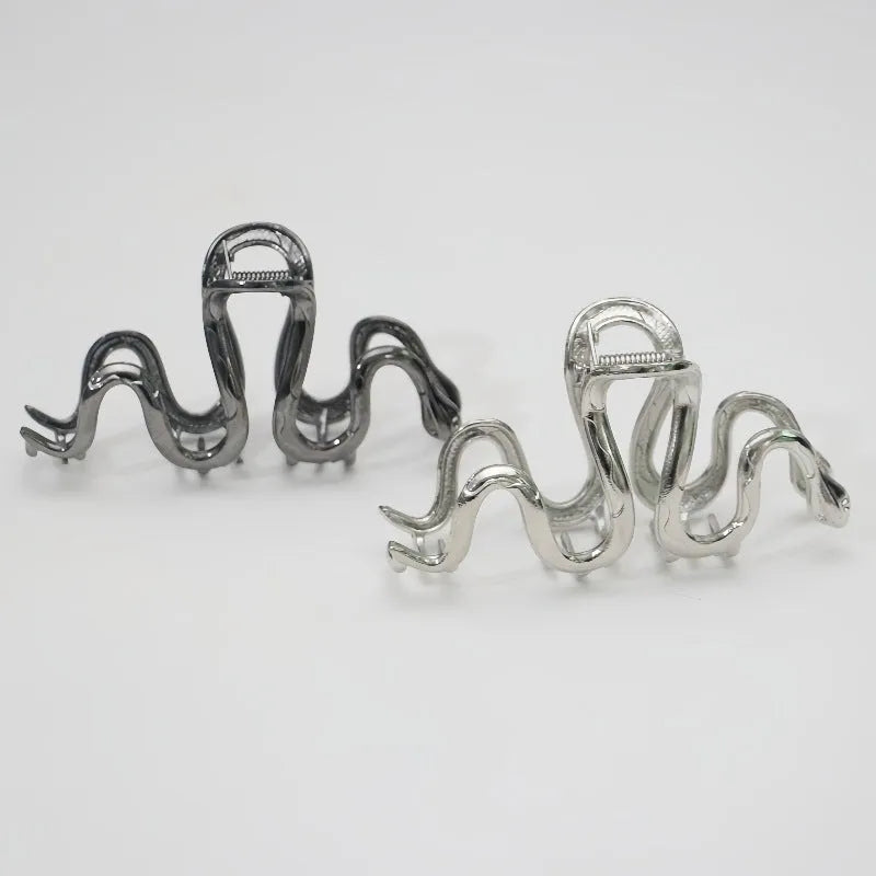 Slytherin serpentine metal hair barrette showing 10.5cm snake design in silver electroplated finish