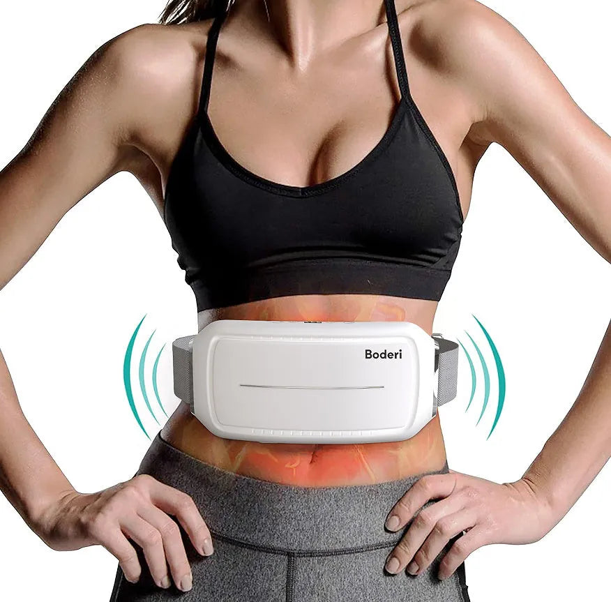 White Tummy Machine abdominal exercise equipment with digital display on a grey floor.