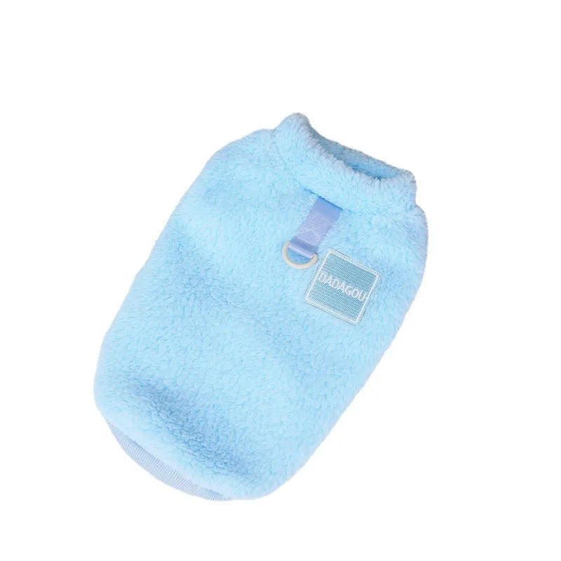 A blue coral fleece pet jacket for dogs or cats fastened with multicoloured pull rings.