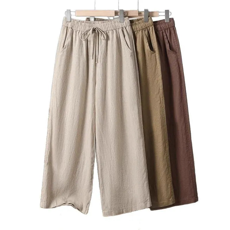 Women's straight-leg casual trousers with elastic waist and drawstring in polyester fabric