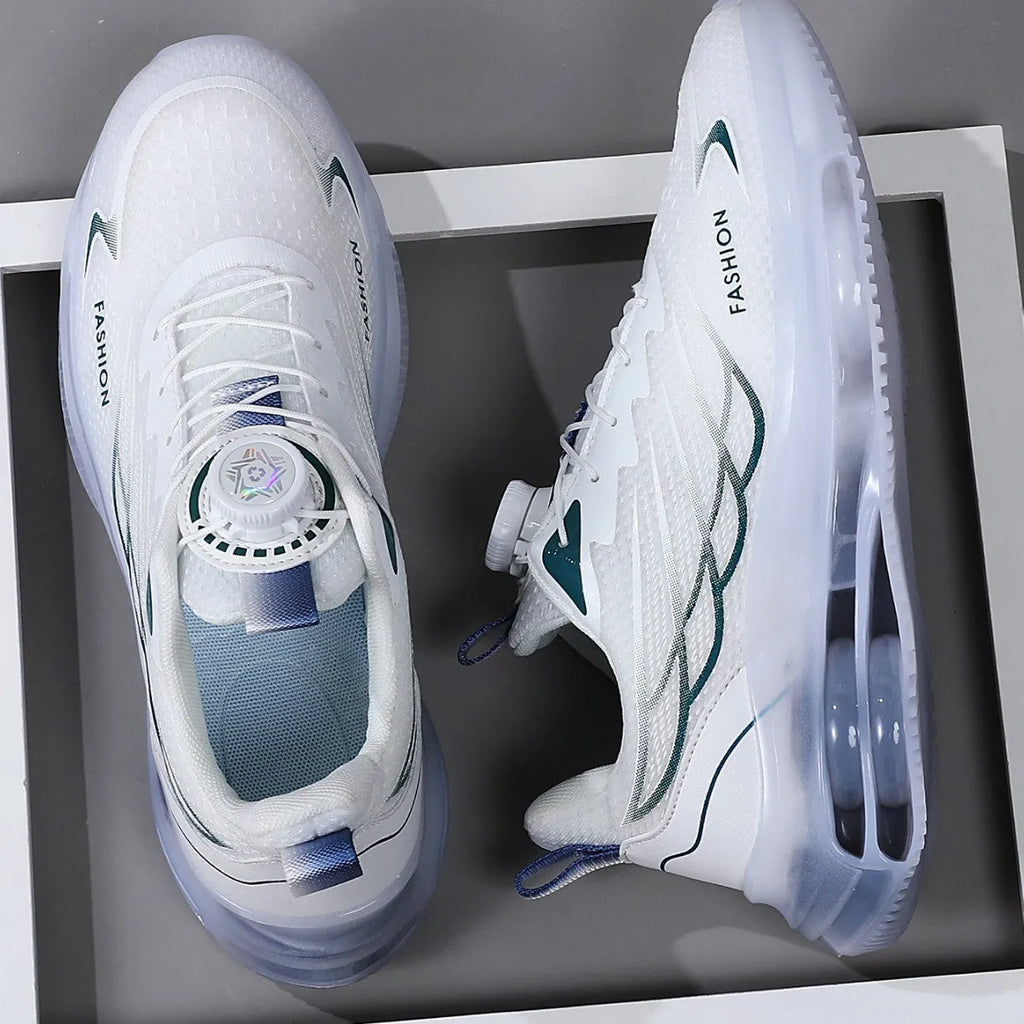 White youth sports casual shoes with rotating button and lace-up closure, mesh upper, and rubber sole.