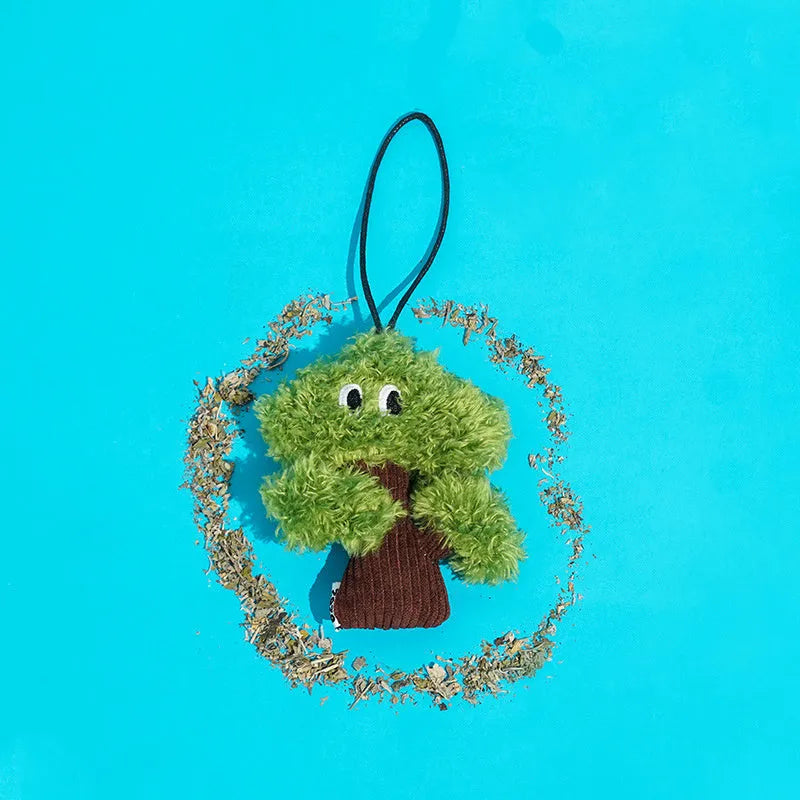 Pine wood base cat toy with fabric catnip pouch hanging from a string.