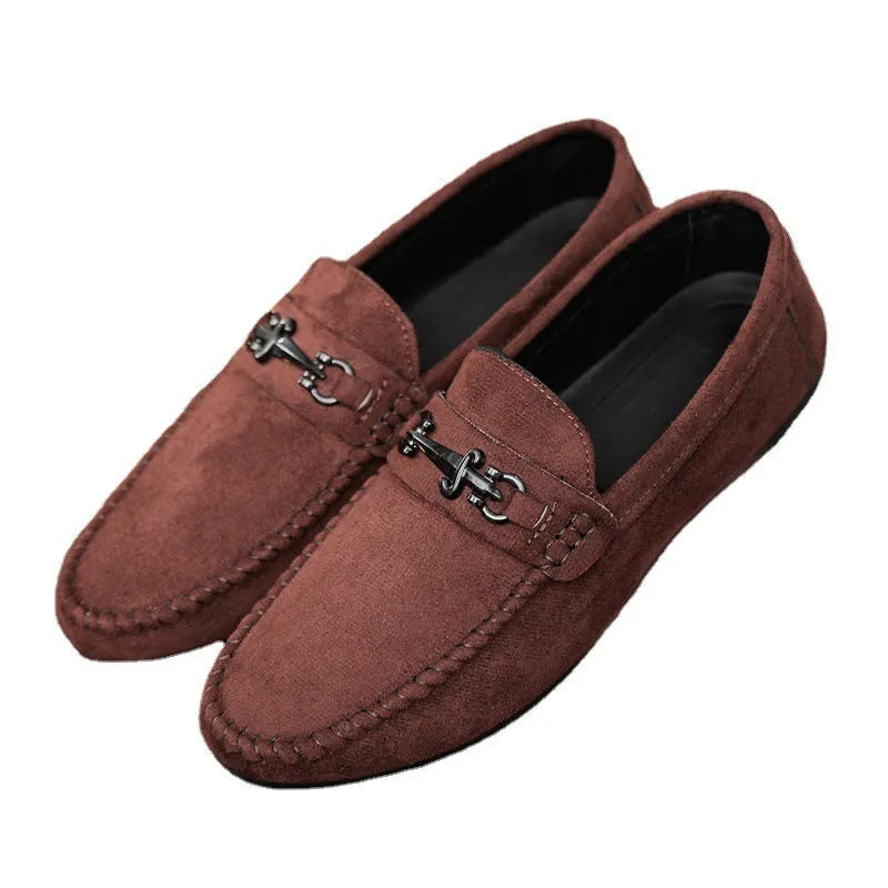Men's black and brown waterproof slip-on loafers with round toe and rubber sole.