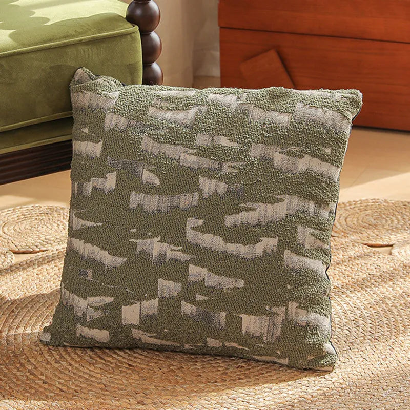 Square jacquard pillow with botanical floral pattern, shown in one of eight available colour options.