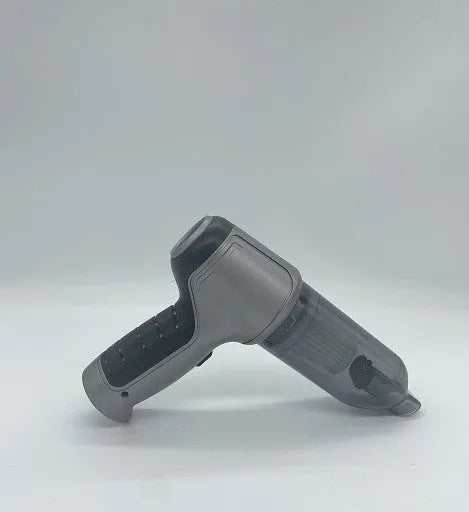 Compact gold wireless charging car vacuum cleaner with dust bucket on a car seat
