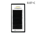 Dense 16-row mink hair false eyelashes on a white background, showing natural fibre texture.