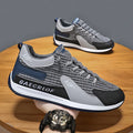 Men's grey and green mesh running shoes with low-top design and lace-up closure