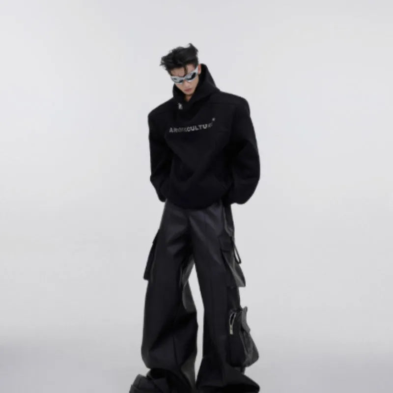 Men's black hooded sweater with heavy shoulder pads and silver metal-effect 3D printing detail.