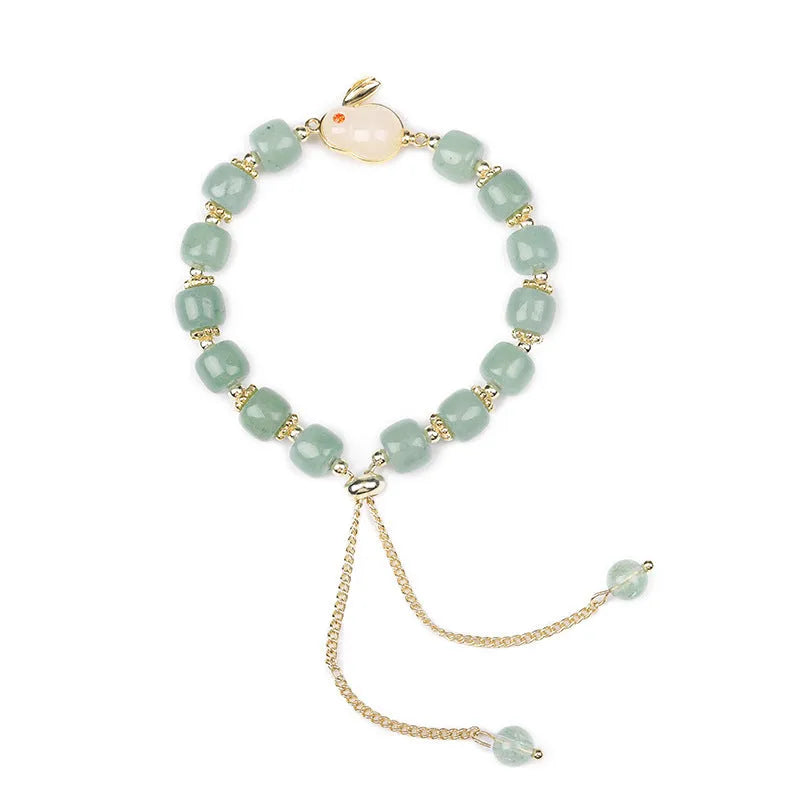 Rabbit bracelet with natural stone charms including green aventurine or strawberry quartz options with mixed metal components
