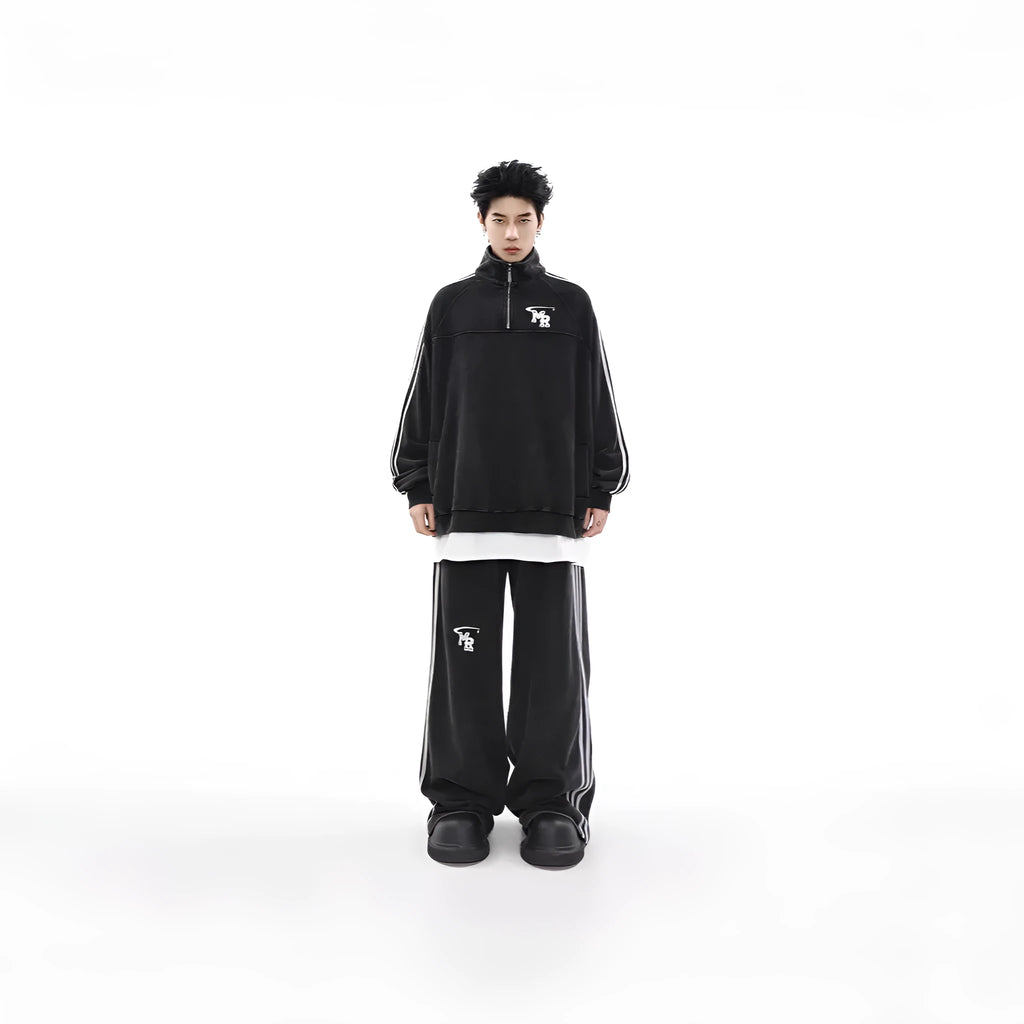 Black Hong Kong style retro sports hoodie with stand collar, shown on a model.
