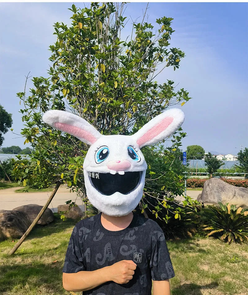 White plush rabbit head decorative cover for an electric motorcycle helmet.