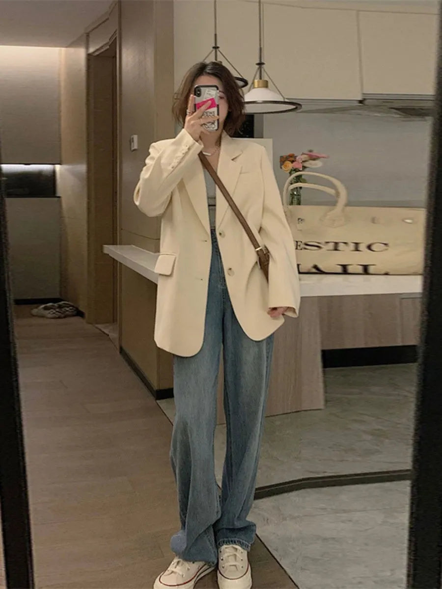 Women's Korean style small suit jacket in polyester fabric with pocket detail and long sleeves
